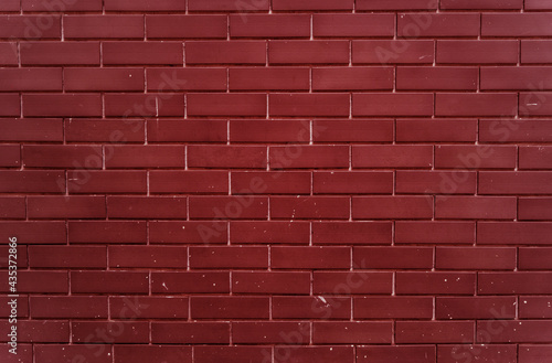 Plain bright red brick wall