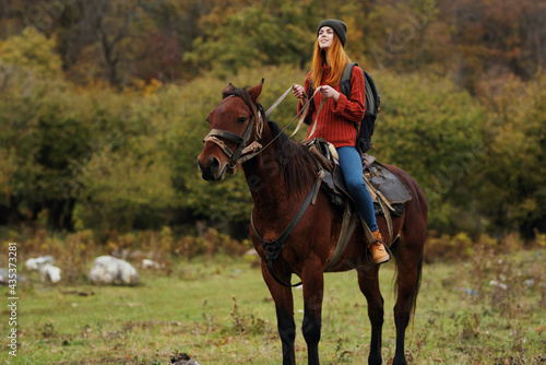 Woman riding horse outdoors fresh air travel landscape © SHOTPRIME STUDIO