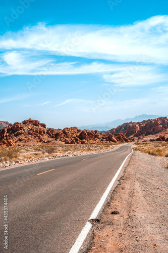 Panorama of the road in the Valley of Fire Park in Nevada. Amazing scenery on the road between the orange rocks