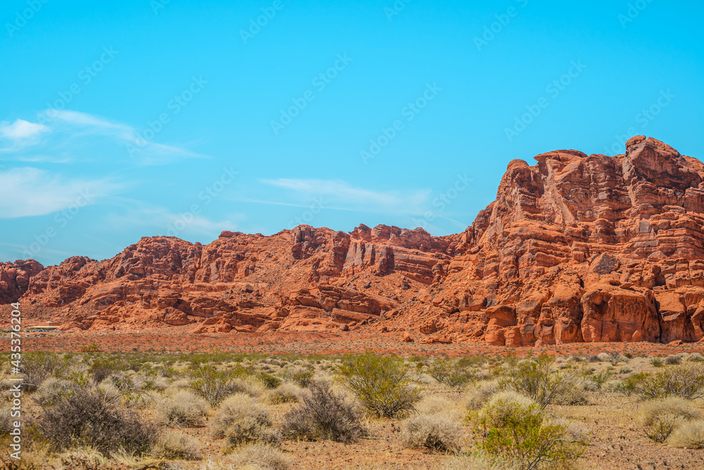Valley of Fire National Park in Nevada. Orange amazing landscape, stones of different shapes and a fire wave Valley of Fire National Park in Nevada. Orange amazing landscape, stones of different shapes and a fire wave