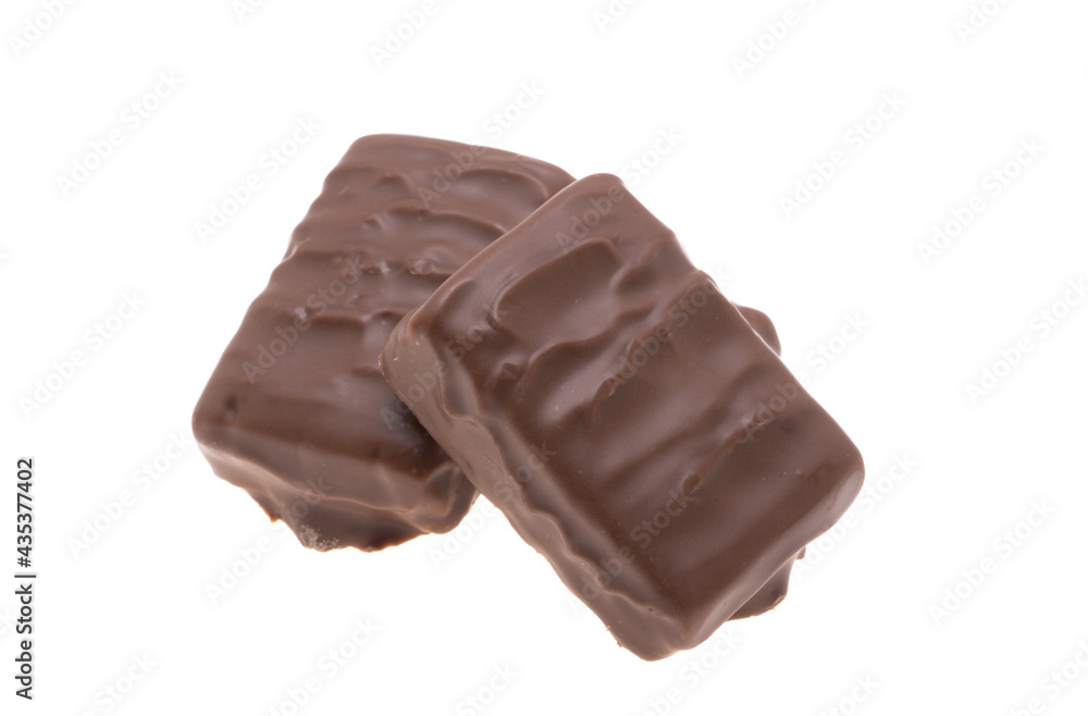 chocolate candies with caramel and nuts isolated chocolate candies with caramel and nuts isolated