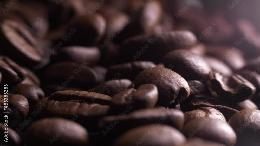 Fingers picking Coffee Beans at industrial factory, extreme close up Fingers picking Coffee Beans at industrial factory, extreme close up