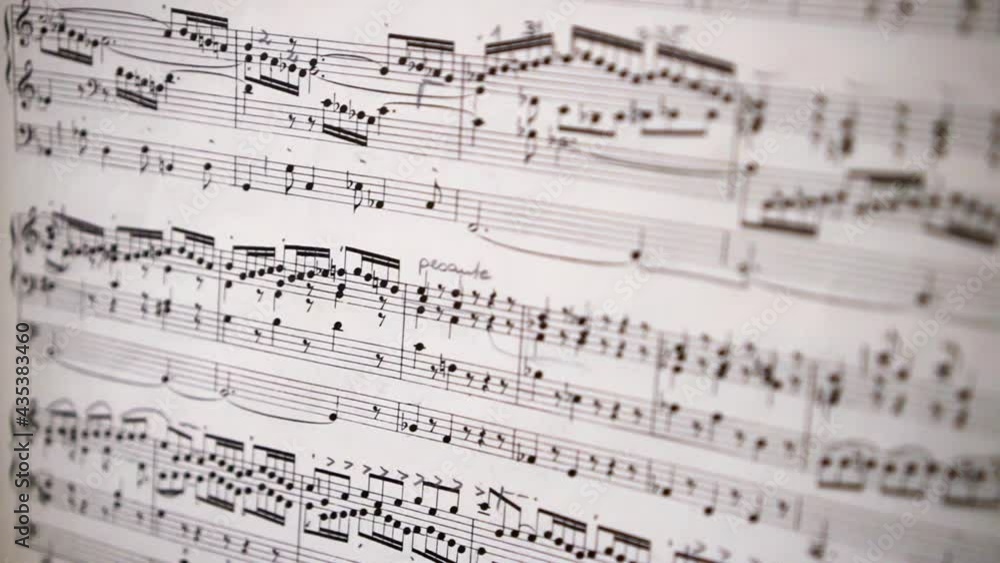 Close-Up Pan Of Printed Black And White Sheet Music - Erfurt, Germany Close-Up Pan Of Printed Black And White Sheet Music - Erfurt, Germany