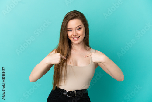 Teenager girl over isolated blue background with surprise facial expression