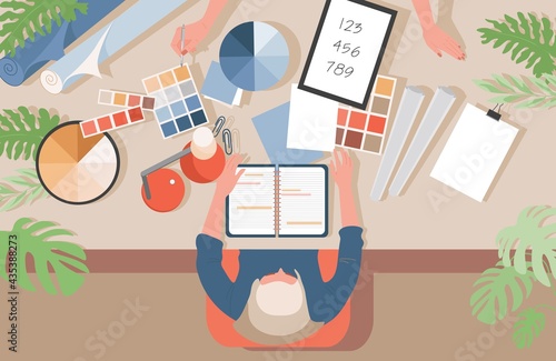Graphic designer at work vector flat illustration. Male or female character working with notepad, designer at workplace with color templates and design symbols. Creative worker in design studio.