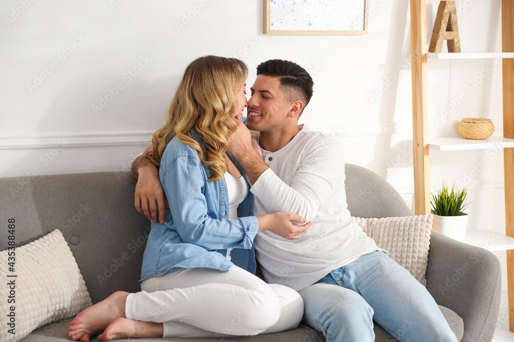 Lovely couple enjoying time together at home