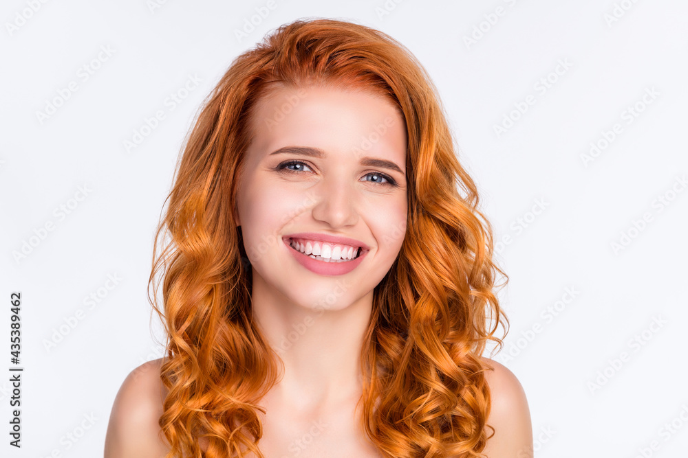 Photo portrait of young model with curly red hair smiling having good mood isolated on white color background Photo portrait of young model with curly red hair smiling having good mood isolated on white color background