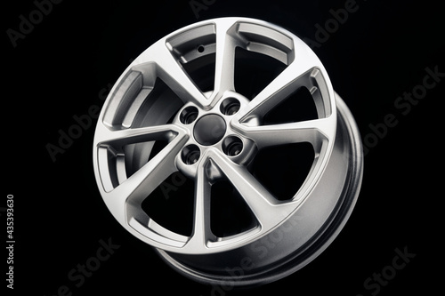 alloy wheel, new, beautiful, modern, shiny, on black background