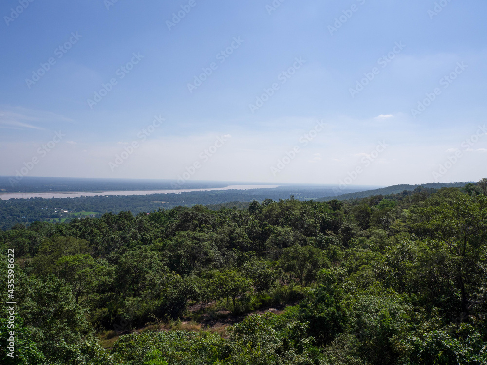 Amazing bird's-eye view mountain scenery of summer, blue sky, forest near .Mekong River in Thailand.