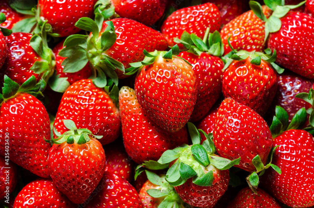 Composition of strawberries inside a box. Background of strawberries Composition of strawberries inside a box. Background of strawberries