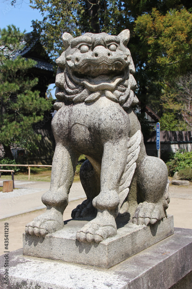 lion statue in a temple in amanohashidate (japan) 