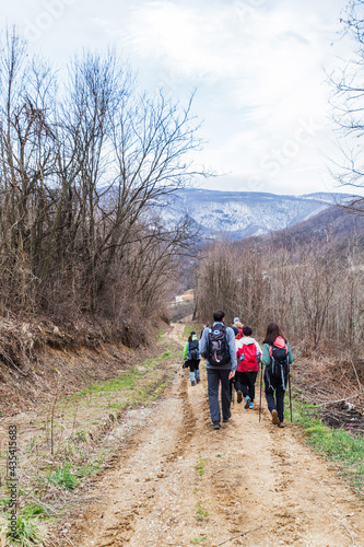 Hiking Group Of People Walking In Nature