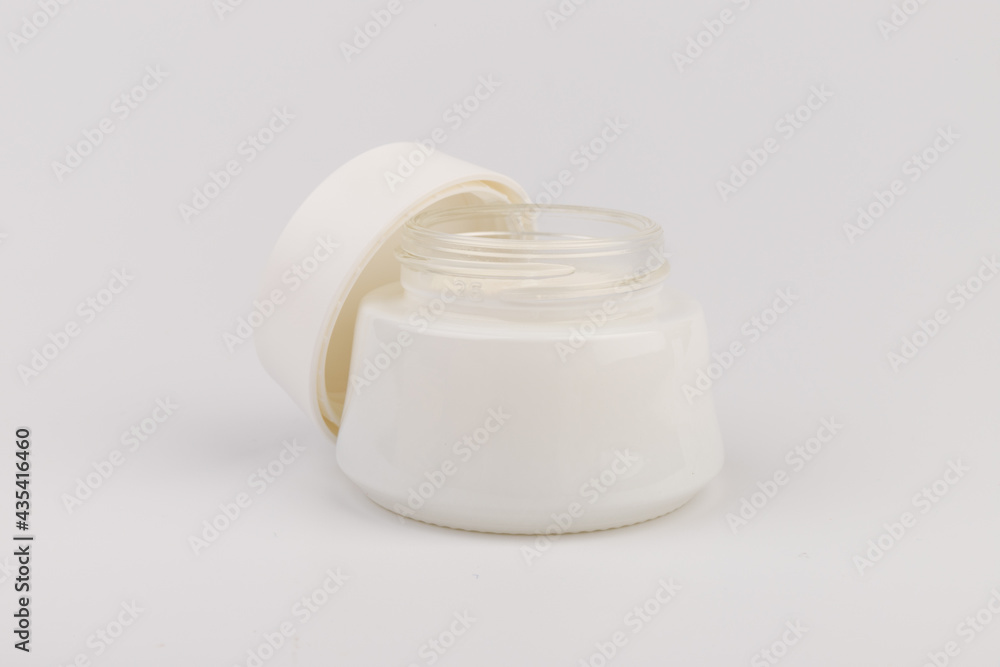Beauty Cream Texture Close Up. Cosmetic Skincare Product In Jar On White Background. High Quality Beauty Cream Texture Close Up. Cosmetic Skincare Product In Jar On White Background. High Quality