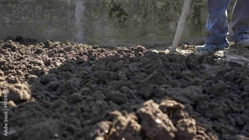 Wallpaper Mural Farmer prepares the land for sowing. Slow motion 4K Torontodigital.ca