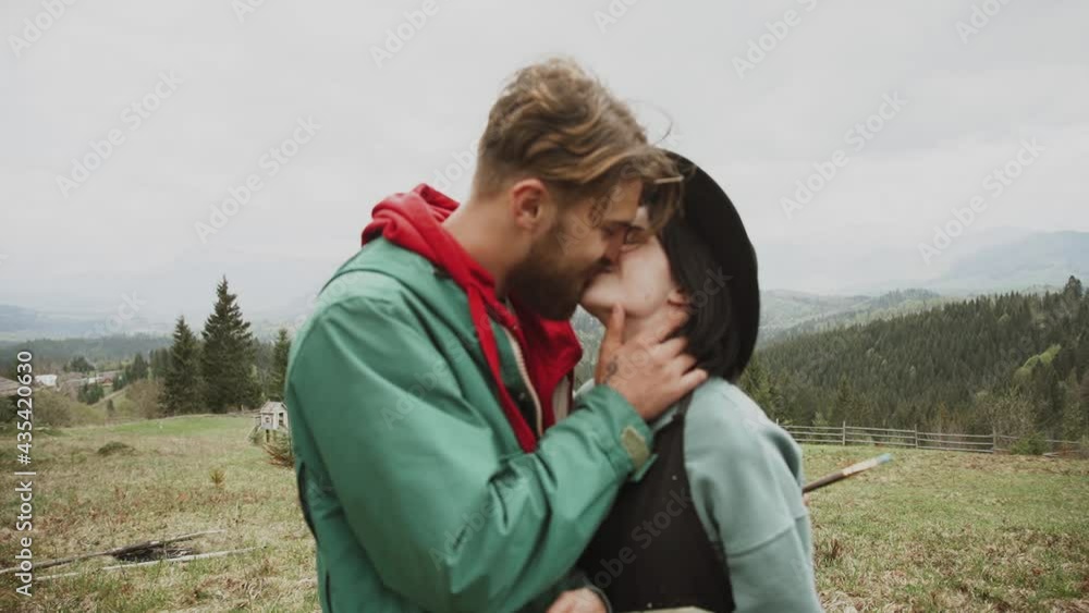 A family of artists creates a painting with a magnificent view of the mountains.Painting concept A family of artists creates a painting with a magnificent view of the mountains.Painting concept