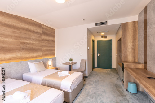 Interior of a double bed hotel bedroom in luxury hotel © rilueda