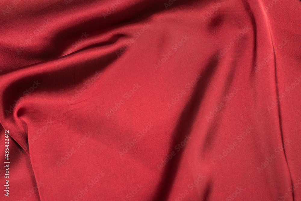 Red silk or satin luxury fabric texture can use as abstract background. Red silk or satin luxury fabric texture can use as abstract background.