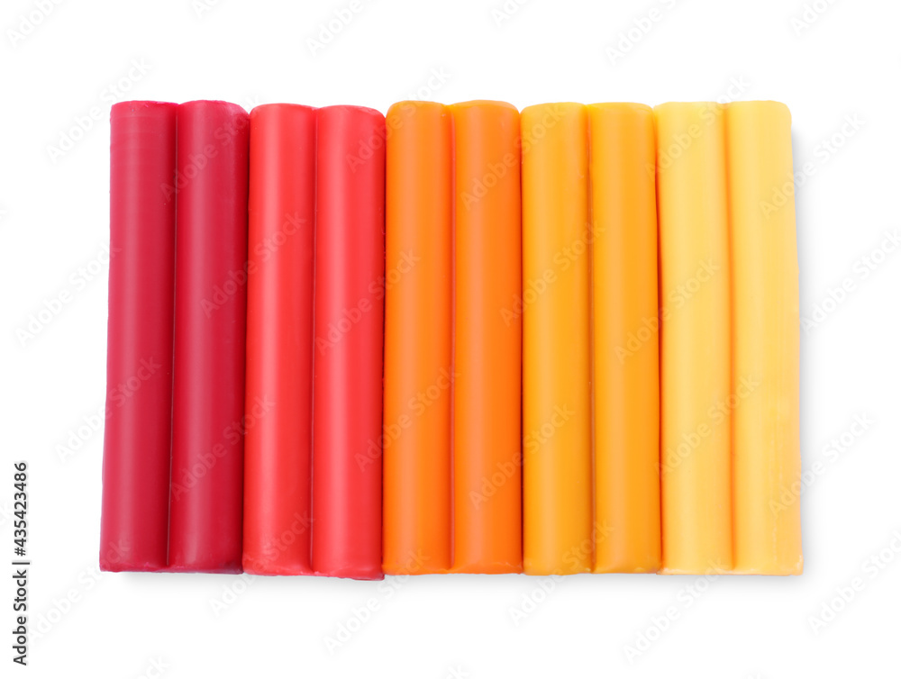Many different colorful plasticine pieces on white background, top view Many different colorful plasticine pieces on white background, top view