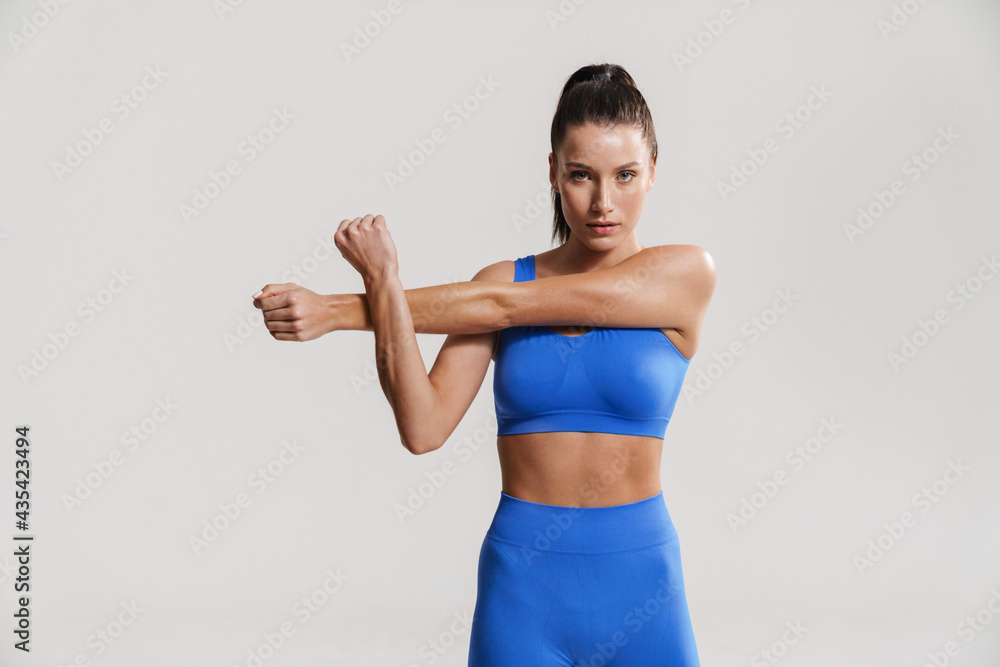 Young white fitness woman in sportswear with ponytail Young white fitness woman in sportswear with ponytail