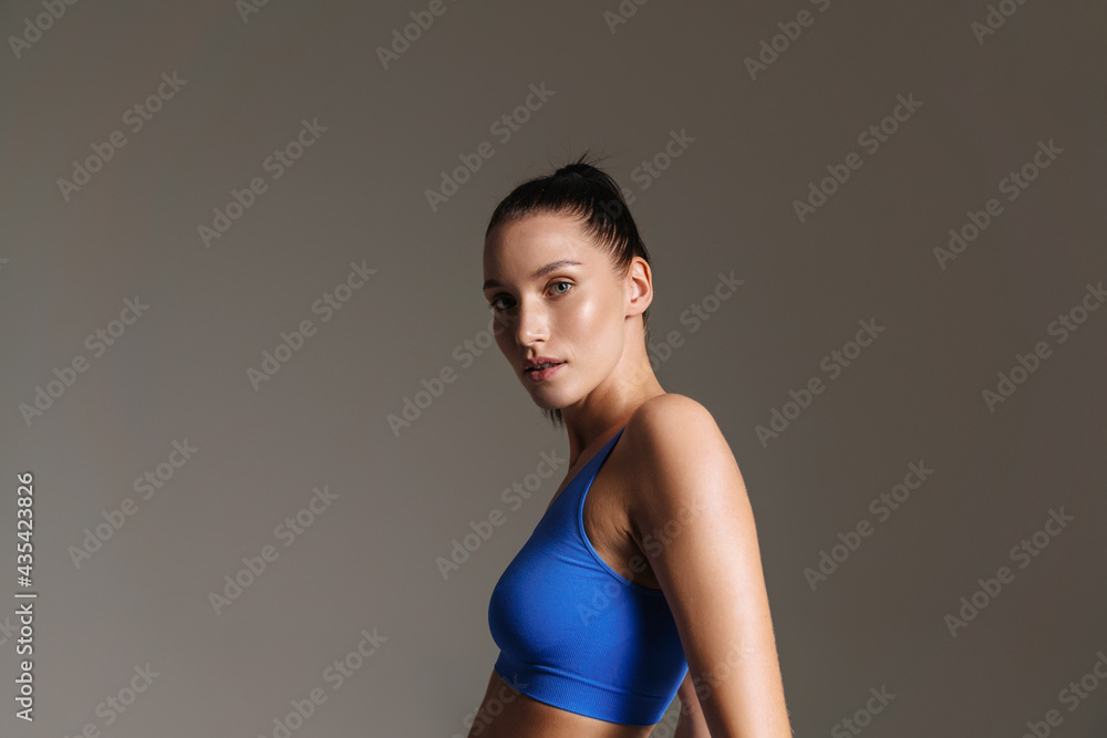 Young white fitness woman in sportswear with ponytail Young white fitness woman in sportswear with ponytail