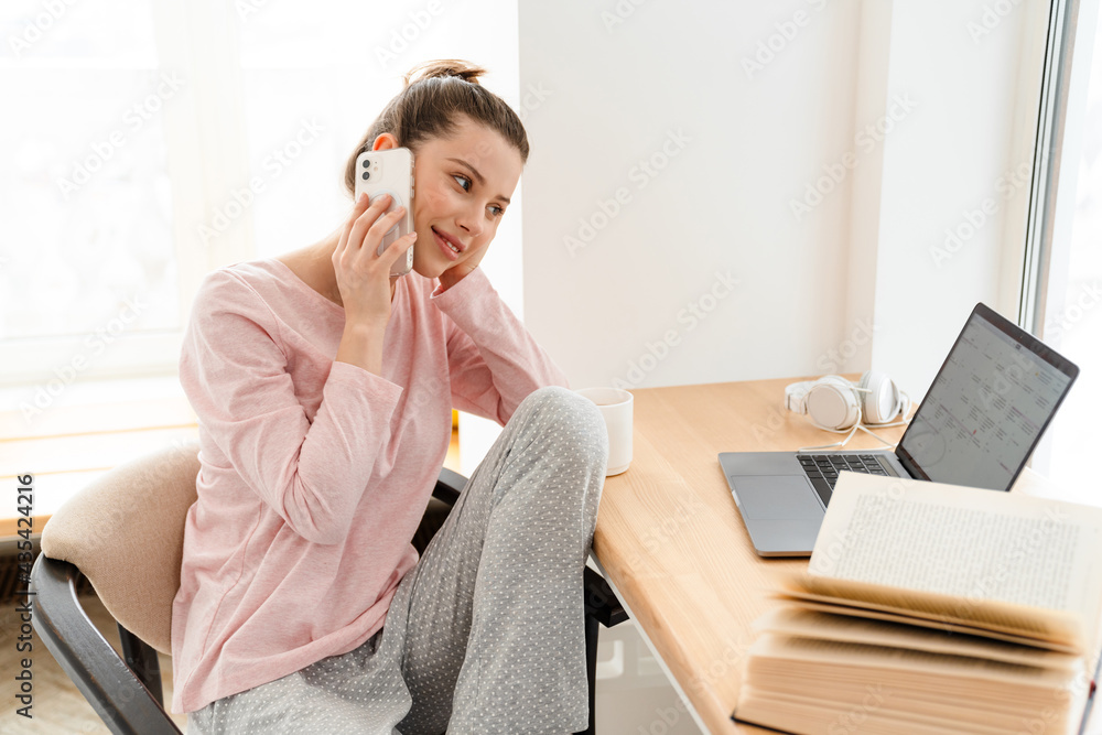 Happy young white woman wearing lounge Happy young white woman wearing lounge