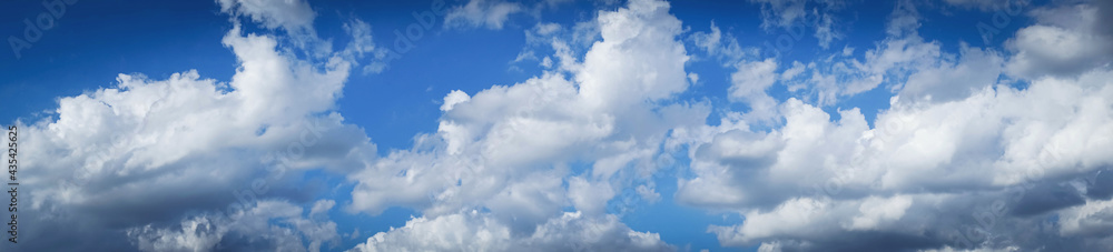blue sky background with tiny clouds. panorama, Background with clouds on blue sky. blue sky background with tiny clouds. panorama, Background with clouds on blue sky.