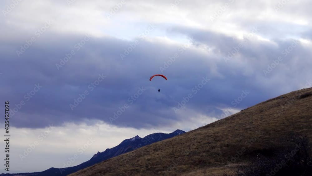 Para glider flying over Boulder, Colorado Para glider flying over Boulder, Colorado