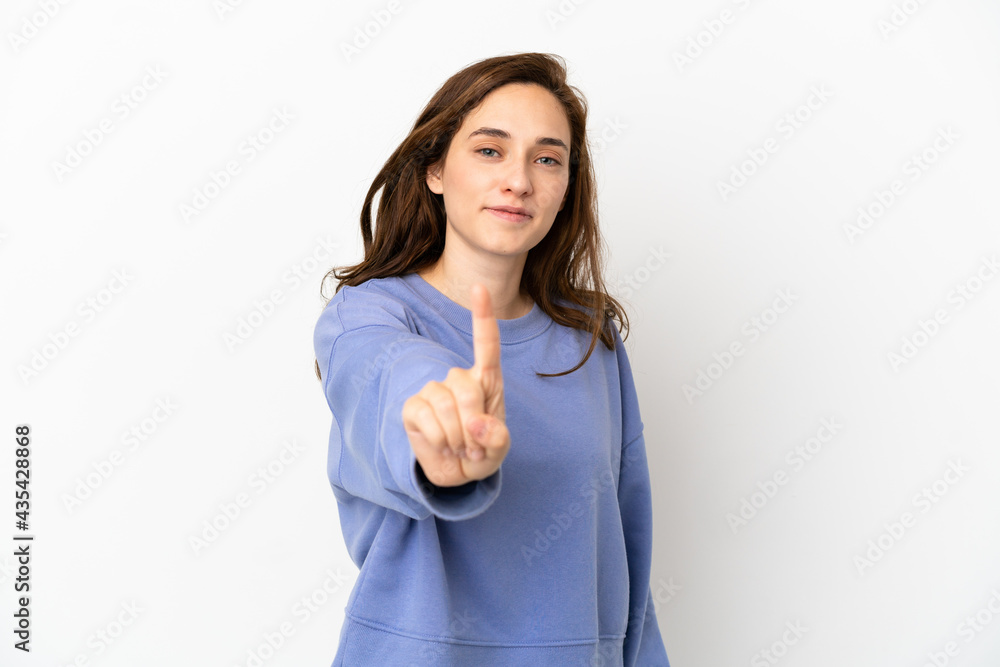 Young caucasian woman isolated on white background showing and lifting a finger Young caucasian woman isolated on white background showing and lifting a finger