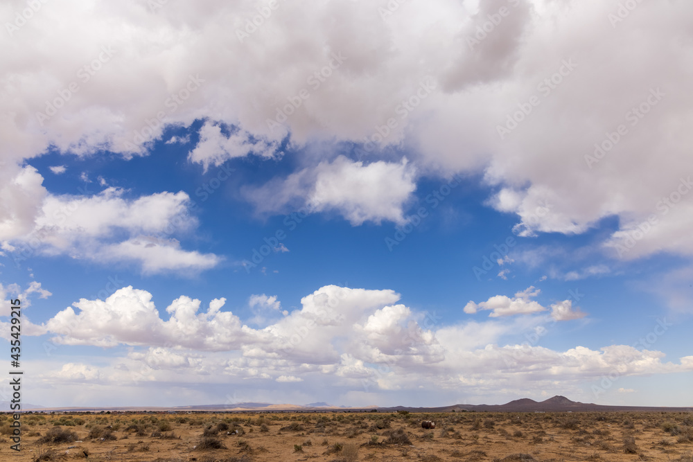 clouds over plains