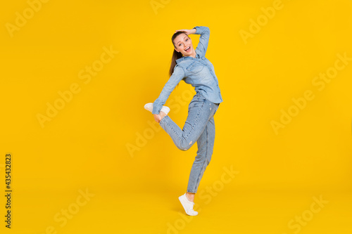 Full length body size photo young pretty girl relaxing at party laughing isolated bright yellow color background