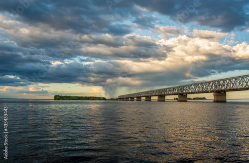 Picturesque clouds above bridge across the Dnieper river  Cherkasy  Ukraine before the storm