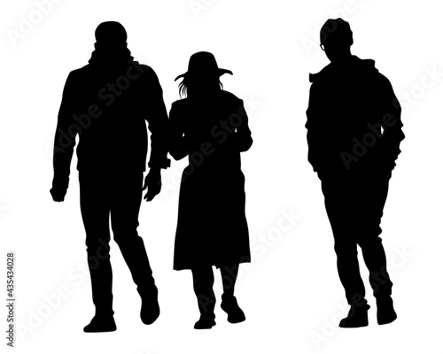 Man and women walking on street. Isolated silhouette on a white background