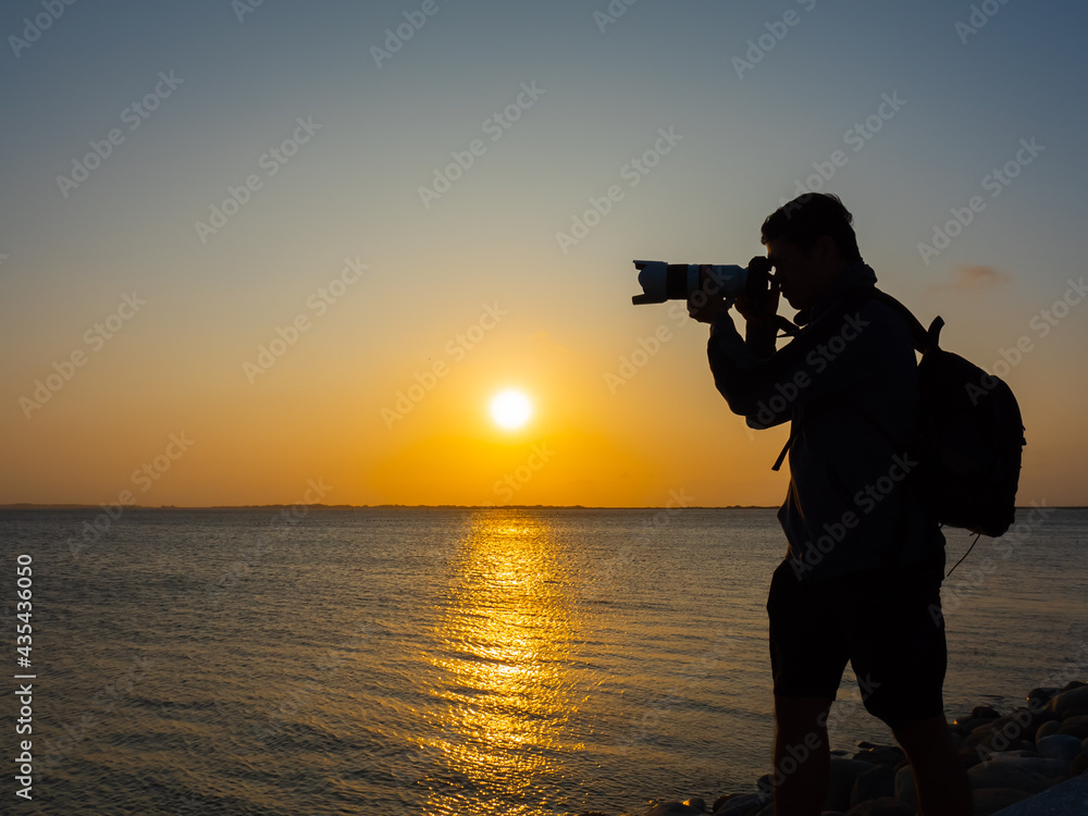 photographer take photo at sunset photographer take photo at sunset