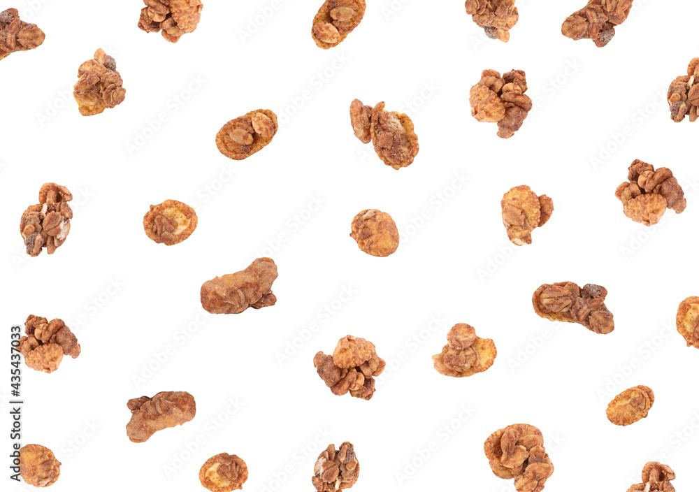 Delicious granola falling on white background. Healthy snack Delicious granola falling on white background. Healthy snack