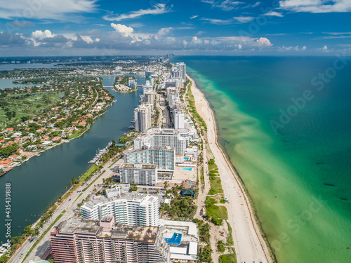 Photography Aerial Miami Beach along Collins Avenue mid beach waterway with Yacht Marina and