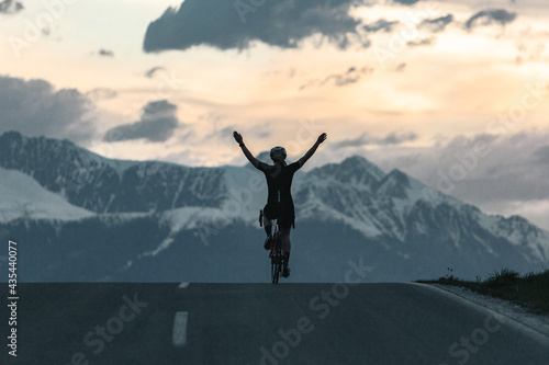 Person riding bike at top of mountain