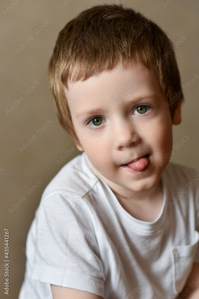 Portrait of smiling baby boy with tongue out Portrait of smiling baby boy with tongue out