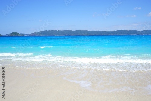 Beautiful summer scenery. calm waves on the blue water. Furuzamami Beach in Zamami island, Okinawa, Japan. Closeup - 日本 沖縄 座間味島 古座間味ビーチ 青い海