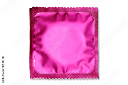 Bilde på lerret Close up of a pink condom on white background, wrappers in square and rectangle packaging on white background - Clipping Path