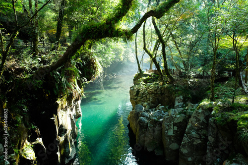 Fotografi An undiscovery  beautiful waterfall and green river in Japan