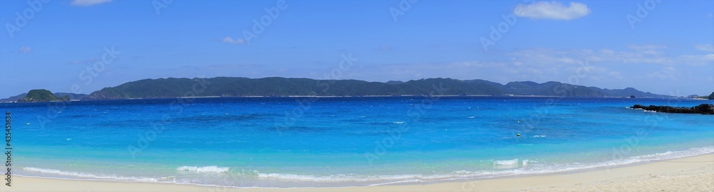 Beautiful summer scenery. calm waves on the blue water. Furuzamami Beach in Zamami island, Okinawa, Japan. Panoramic view - 日本 沖縄 座間味島 古座間味ビーチ