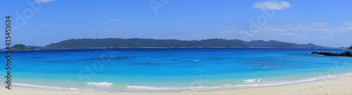 Beautiful summer scenery. calm waves on the blue water. Furuzamami Beach in Zamami island, Okinawa, Japan. Panoramic view - 日本 沖縄 座間味島 古座間味ビーチ