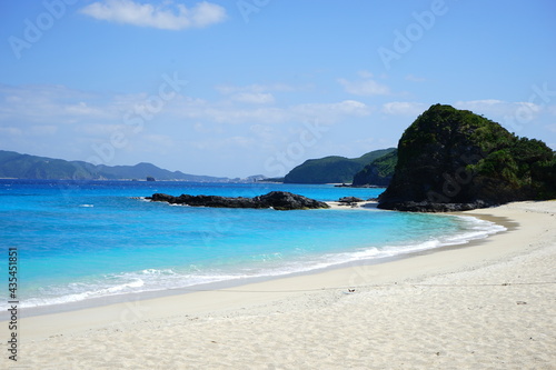 Beautiful summer scenery. calm waves on the blue water. Furuzamami Beach in Zamami island, Okinawa, Japan - 日本 沖縄 座間味島 古座間味ビーチ 青い海 