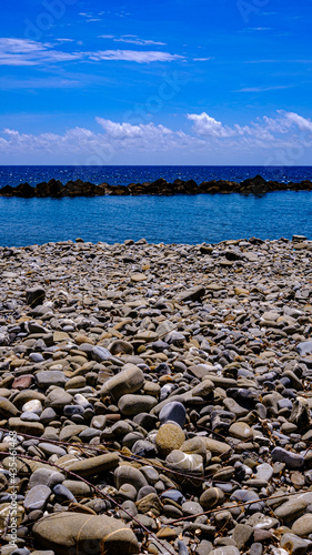 Pioppi beach, Cilento, Campania, Italy. Pebbles, blue sea and blue sky © karzof pleine