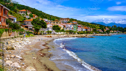 panorama of Pioppi with beach, blue sea and houses. Pioppi, Cilento, Campania, Italy photo