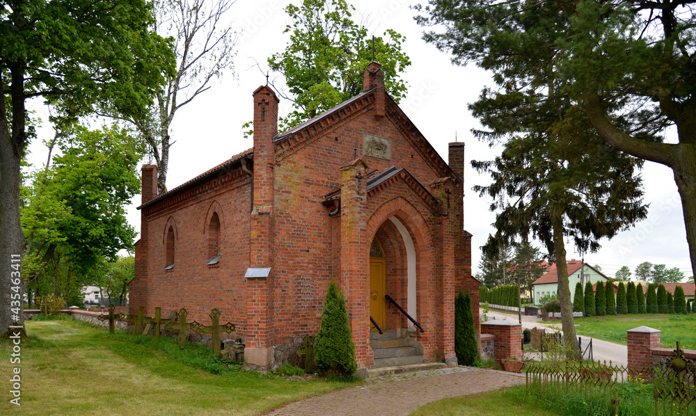 General view and close-ups of architectural details of the funeral chapel at the Catholic Church of the Assumption of the Blessed Virgin Mary, in the town of Galiny, warmi, Poland.