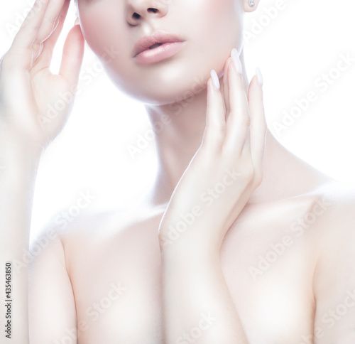 Lips  beauty partial portrait of model woman with hands on face perfect skin  natural makeup. Skincare facial treatment concept