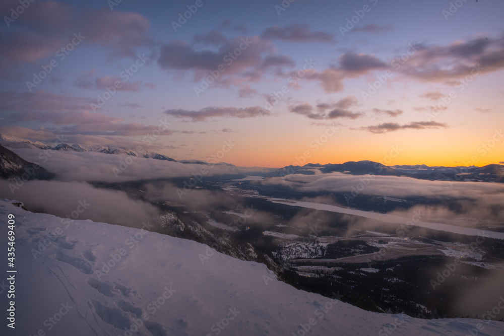 Cloudy mountain sunset in winter