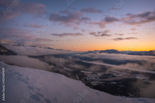 Cloudy mountain sunset in winter © Damien Richard