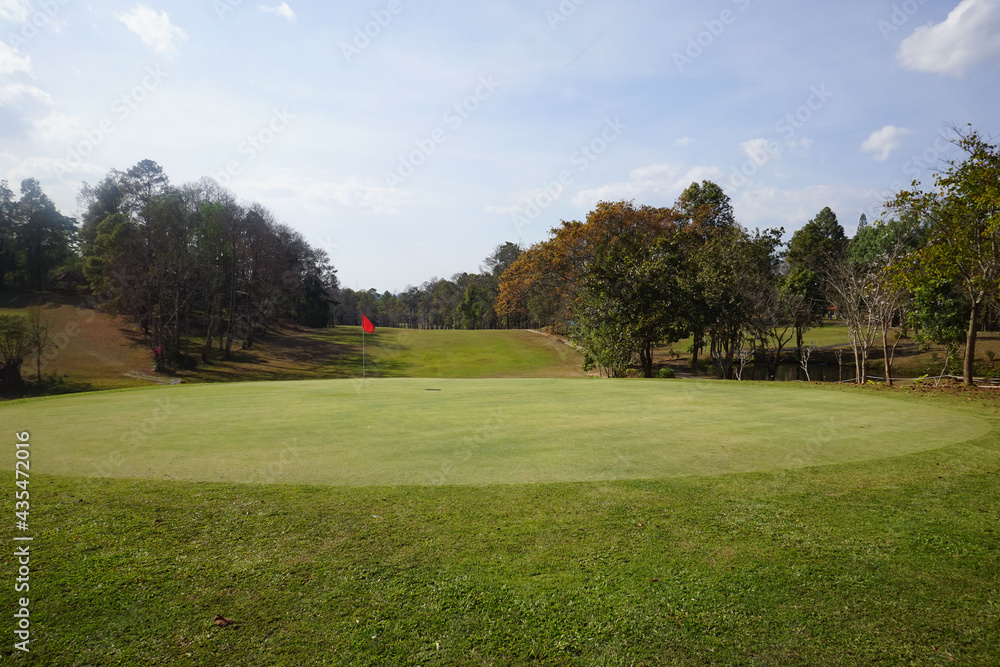 Landscape of a beautiful golf course at the sunset in the countryside. Landscape of a beautiful golf course at the sunset in the countryside.